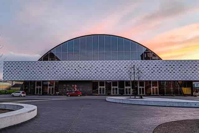 Modern K.B. Hallen Suites venue with geometric facade, ideal for conferences and exhibitions