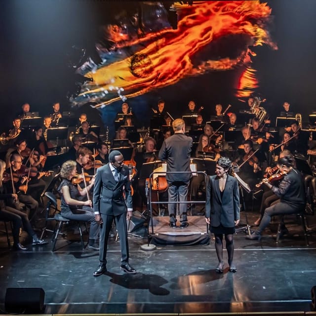 Copenhagen Opera Festival concert with orchestra in dynamic performance setting.
