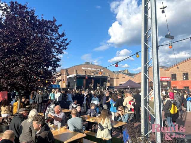 Copenhagen Jazz Festival 2024 outdoor concert with lively crowd and festive lighting.