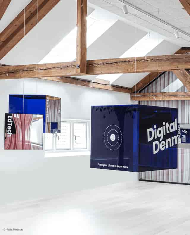 Modern event space at Digital Hub Denmark with geometric displays, ideal for EdTech networking.