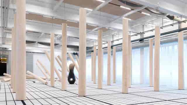 Modern event space with wooden pillars in Copenhagen Contemporary for workshops or art.