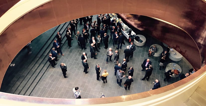 Lively networking event at The Rooftop, showcasing modern design and collaboration.
