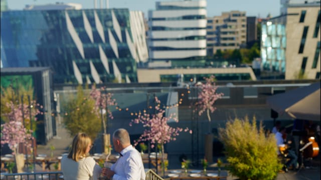 Stylish outdoor rooftop venue with modern architecture for events and gatherings.