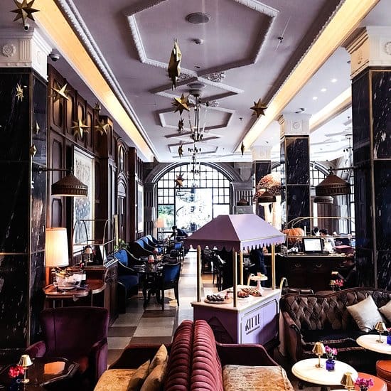 Elegant hotel lobby for private events, ideal for networking and conferences.