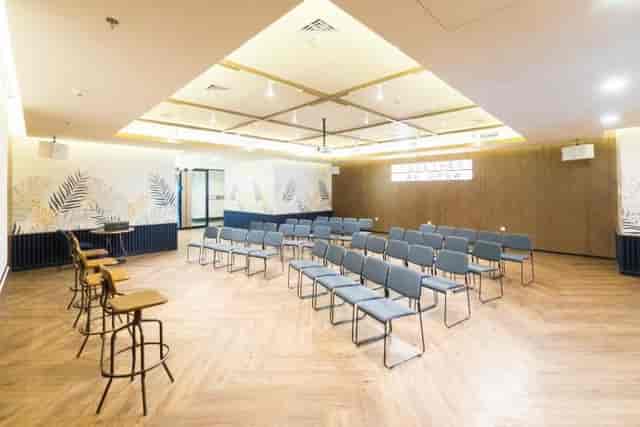Modern meeting room with versatile seating for workshops and presentations at GoWork Event Space.