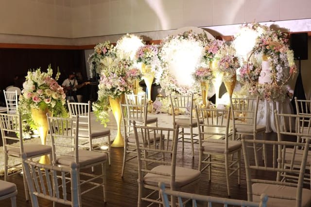 Ramayana Terrace wedding setup with floral decor at Hotel Indonesia Kempinski Jakarta.