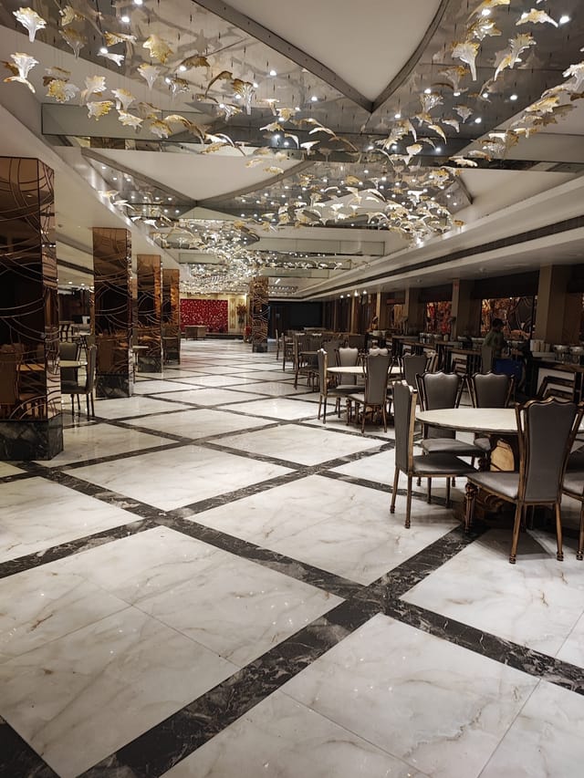 Elegant banquet hall in Crystal Palace with marble flooring, perfect for events.