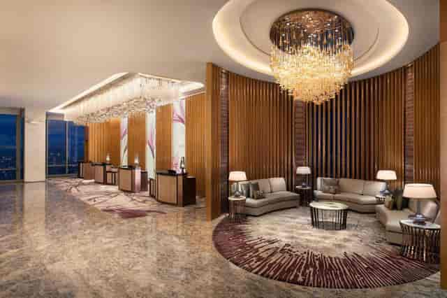 Luxurious hotel lobby in Yogyakarta with modern design, ideal for corporate events.