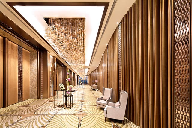 Java Ballroom at The Westin Jakarta: Elegant event space with wooden paneling for networking events.