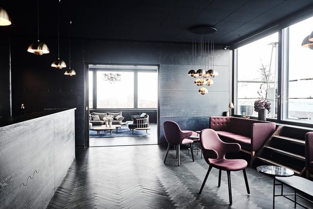 Sleek modern event space in Langelinie Pavillonen, perfect for networking and gatherings.