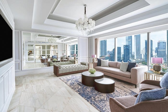 Sophisticated meeting space at The Ritz-Carlton Jakarta with city view and elegant decor.
