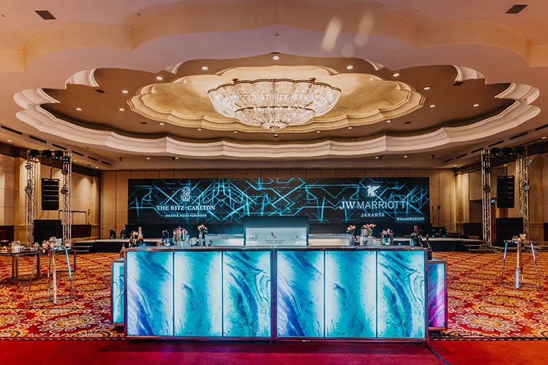 Ritz-Carlton Jakarta Grand Ballroom with sleek stage for professional conference events