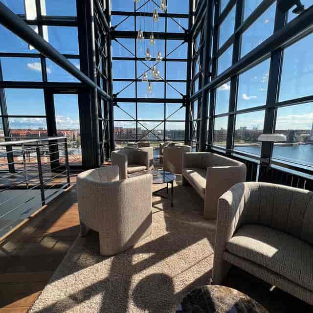 Elegant meeting space with waterfront views for conferences and networking events.