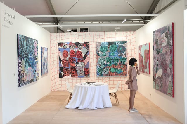 Inviting art gallery in Indonesia with vibrant artwork, ideal for exhibitions and networking.