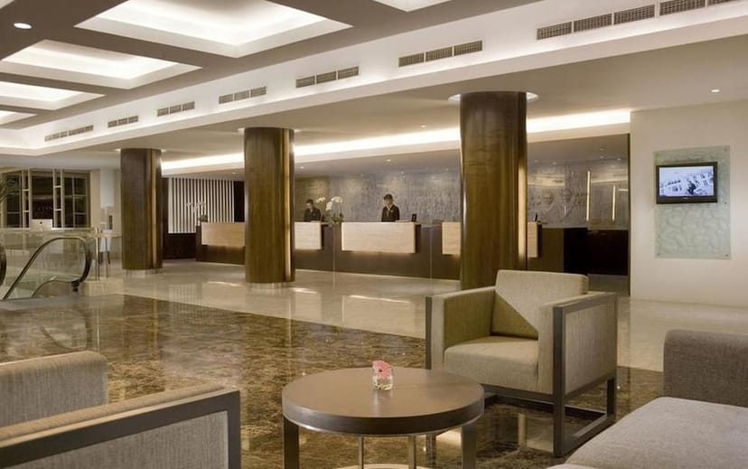 Modern hotel lobby at Hotel Santika Premiere Slipi, ideal for corporate events and meetings.