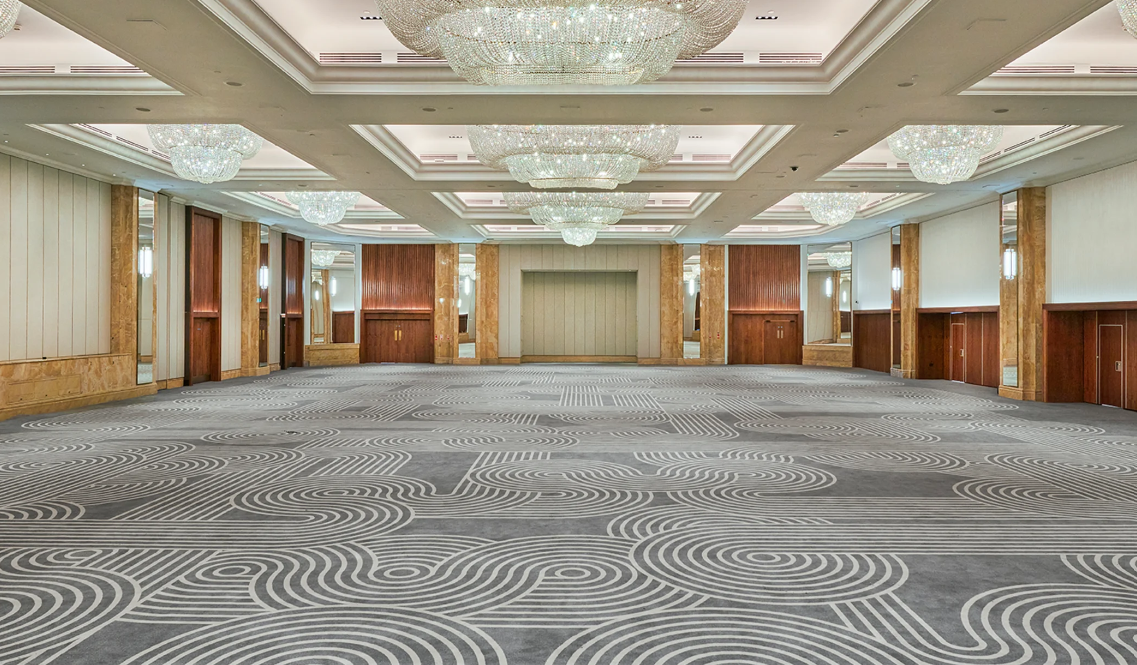 Ballroom at Hilton Park Lane: elegant chandeliers for corporate events and banquets. - Banner