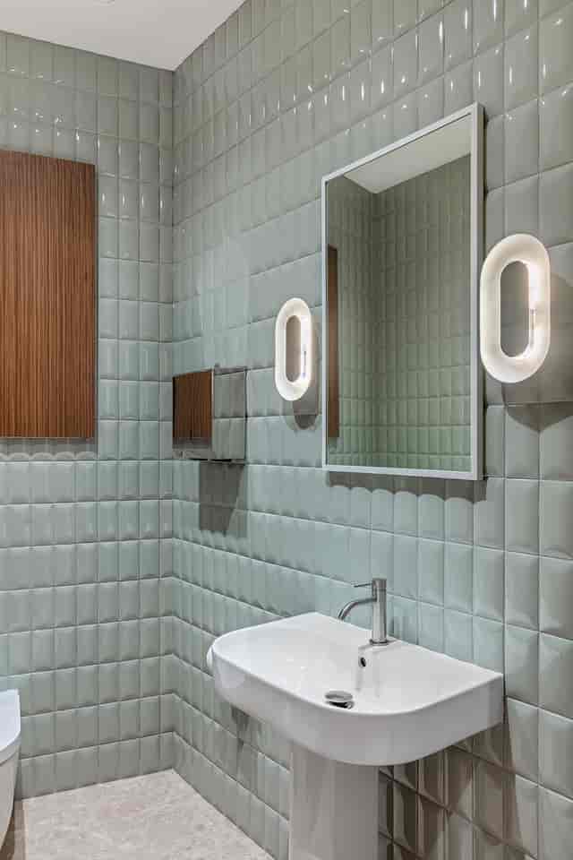 Modern luxury treatment room with textured tiles for stylish event breaks in Eudelo.