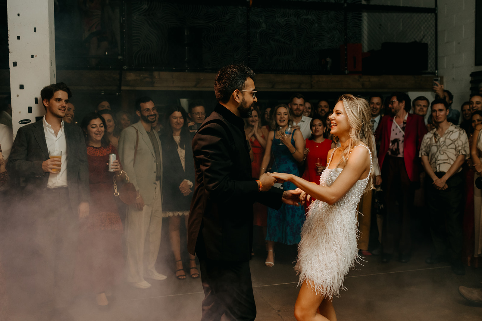 Elegant couple dancing at 90 Live event in Hackney Wick, vibrant atmosphere and memorable experiences. - Banner