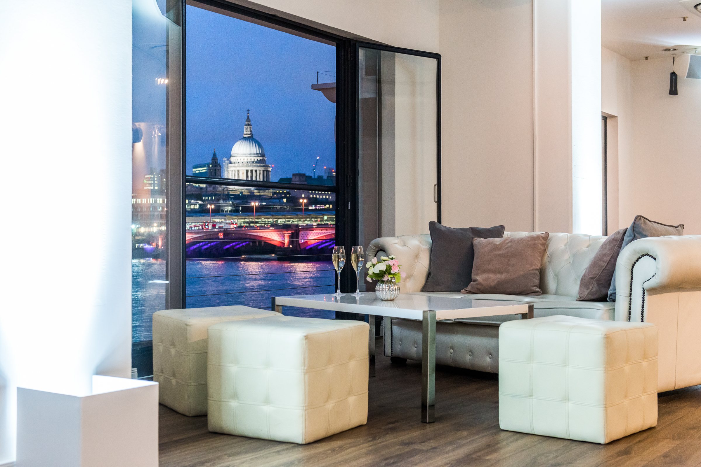 Stylish lounge in OXO2 with St. Paul's view, perfect for upscale events and gatherings. - Banner