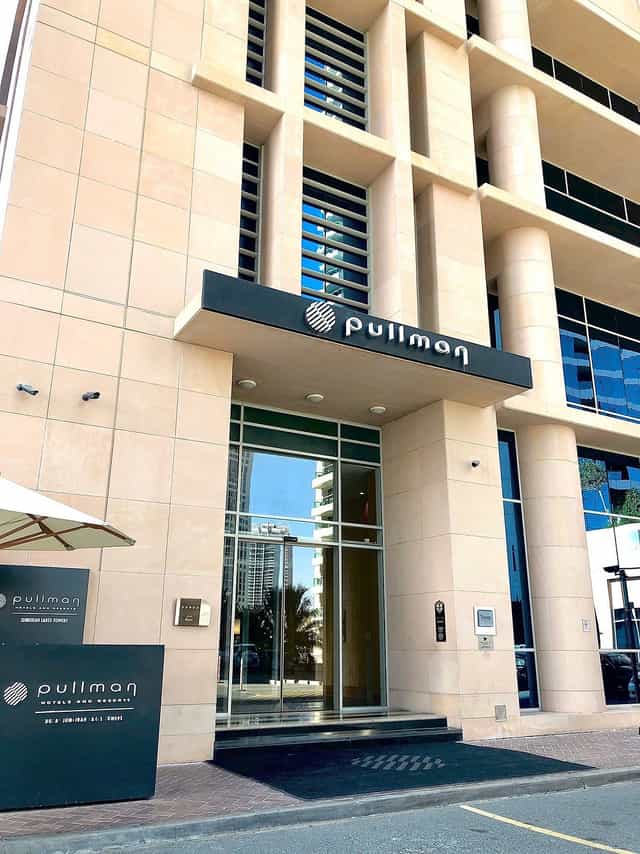 Modern Pullman Dubai hotel exterior, ideal for corporate events and conferences.