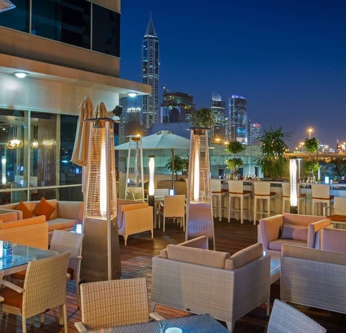 Rooftop venue in Dubai with modern seating, perfect for cocktail parties and receptions