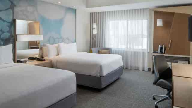 Cypress Meeting Room at Courtyard Houston: modern space with two beds for corporate events.