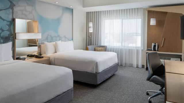 Cypress Meeting Room at Courtyard Houston: modern space with two beds for corporate events.