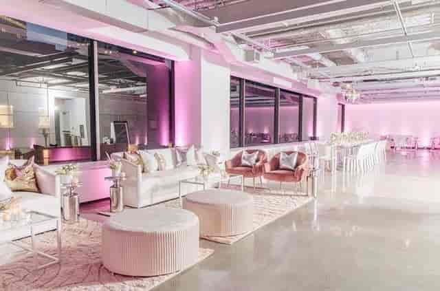 Sophisticated indoor event space with elegant seating for corporate events and upscale parties.