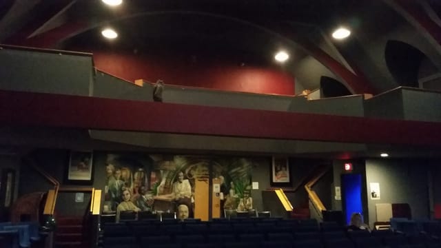 Brattle Theatre auditorium with tiered seating, ideal for conferences and performances.