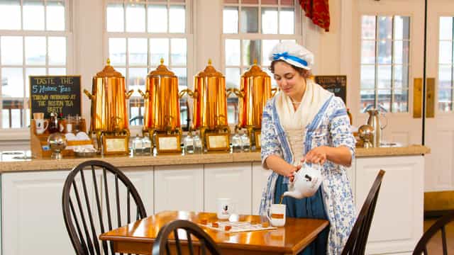 Historic tea event at Abigail’s Tea Room with elegant copper urns and charming ambiance.