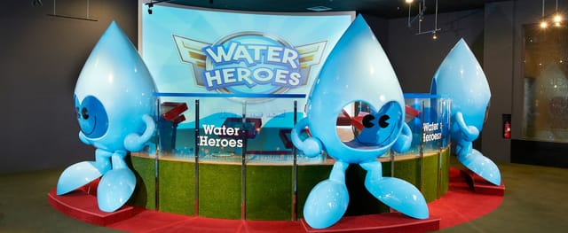 "Bright display at NEWater Visitor Centre promoting Water Heroes for family-friendly events."