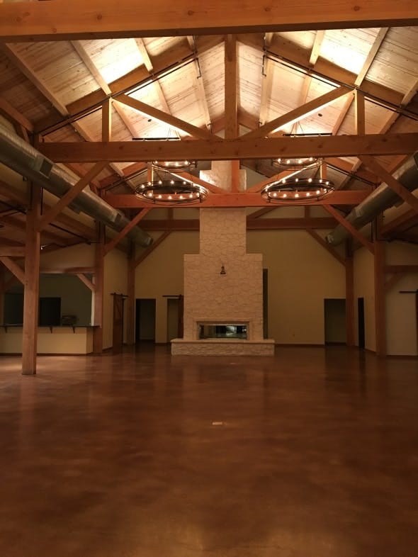 Northwoods Private Room at Magnolia Pancake Haus with rustic beams, perfect for events.