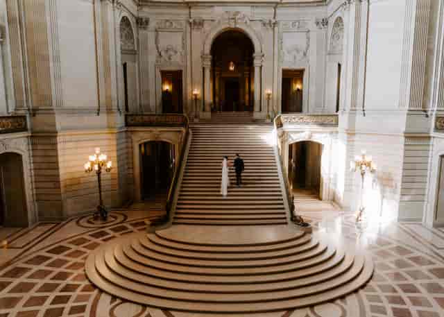 Elegant grand staircase in San Francisco Mayor's Office, perfect for weddings and events.