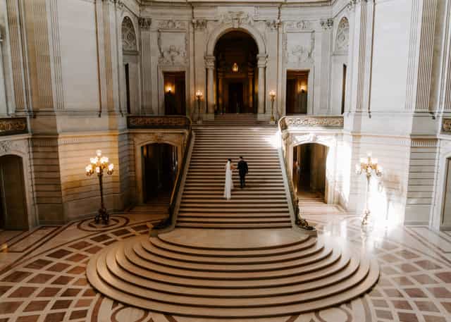Elegant grand staircase in San Francisco Mayor's Office, perfect for weddings and events.