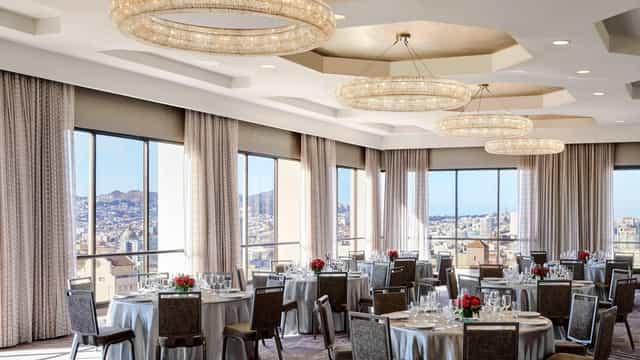 Grand Ballroom in SF Bold with elegant round tables for weddings and corporate events.