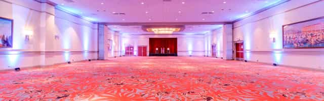 Spacious Holiday Inn San Francisco suite with elegant lighting, ideal for conferences and banquets.