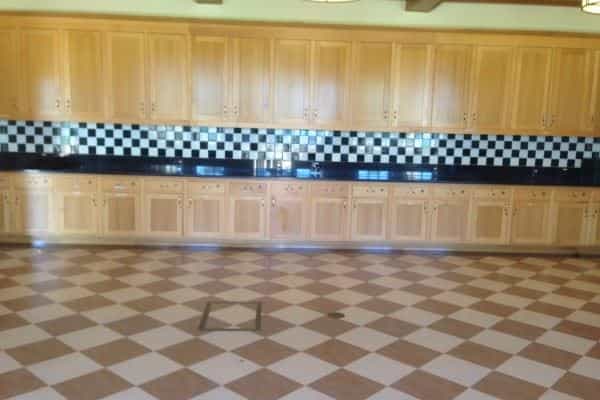 Spacious Moscone Recreation Center kitchen with checkered backsplash for catering events.