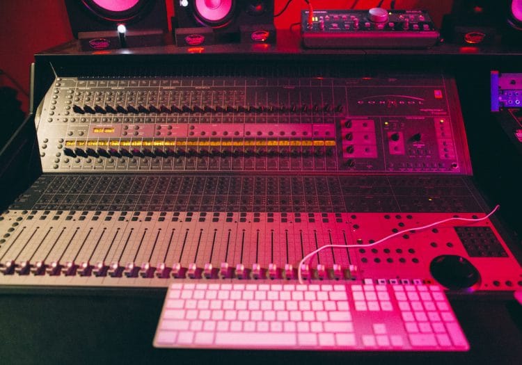 Studio C's audio mixing console enhances sound quality for impactful events and meetings.