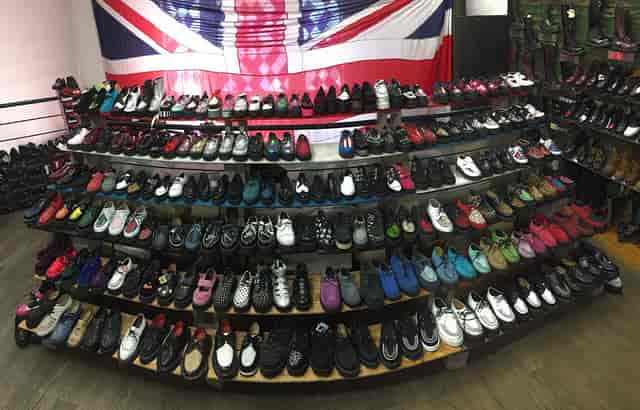 Diverse footwear display for event comfort and style at Club Posers.