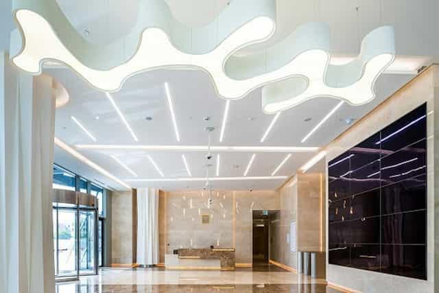Modern meeting room at Al Jalila Foundation with creative lighting, ideal for events.