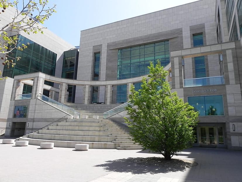 Modern Genentech Hall at UCSF with glass facades, perfect for events and meetings.