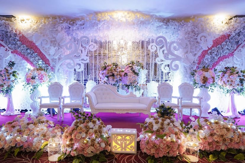 Elegant Crystal Ballroom with floral decor, ideal for weddings and formal gatherings.