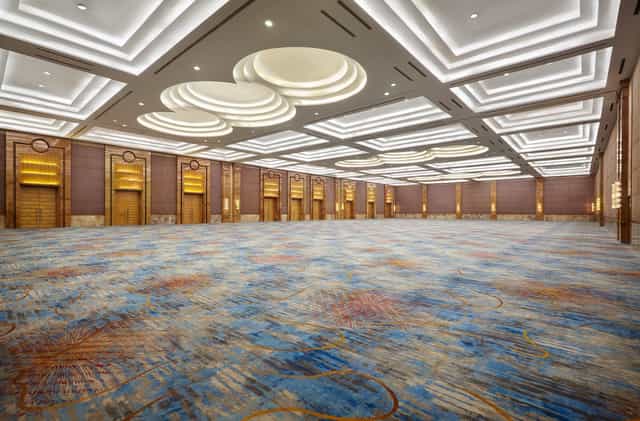Spacious meeting room with high ceilings for conferences and banquets in The Atrium.