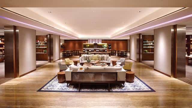 Sophisticated lounge area in The Atrium Ballroom for networking and meetings.