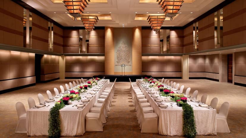 Elegant banquet setup in The Atrium Ballroom for corporate events and formal gatherings.