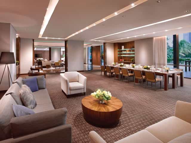 Modern function room with natural light, perfect for meetings and events.