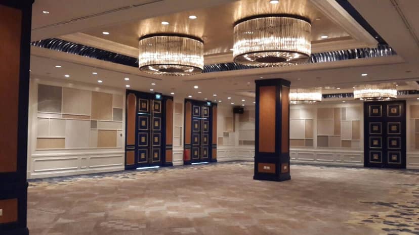 Grand Ballroom at Shangri-La Hotel Jakarta with elegant chandeliers for corporate events.