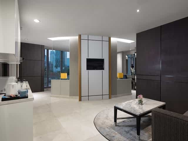Modern meeting room at The Grove Suites, ideal for professional events and presentations.