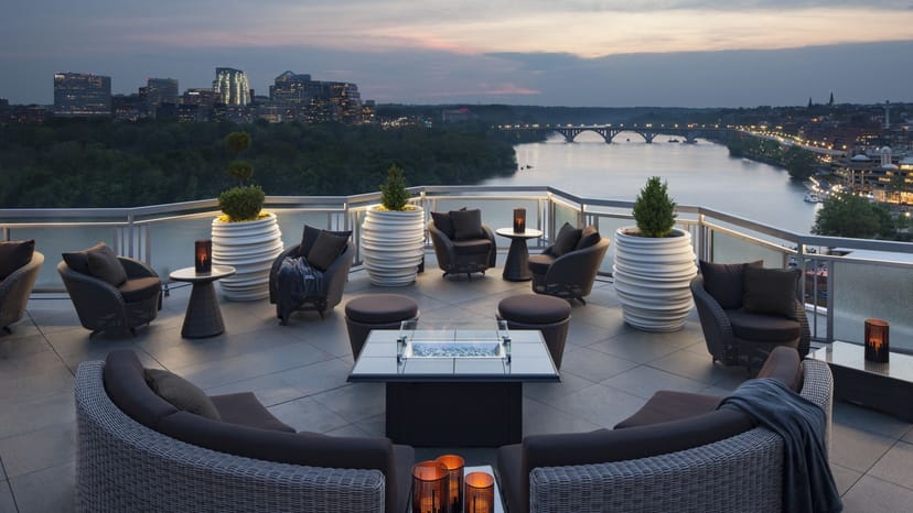 Stylish rooftop event space at Top Of The Gate with river view, perfect for cocktail receptions.