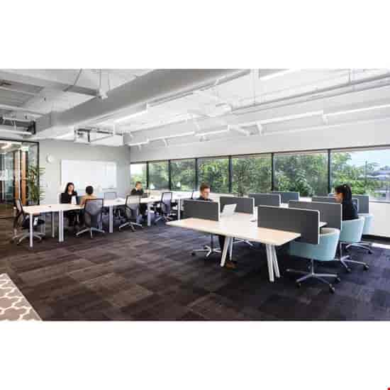 Modern open office space in El Segundo, ideal for workshops and events.